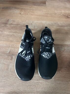 New Balance Black and White Knit Slip-On Sneakers -runs small. Fits like a size9